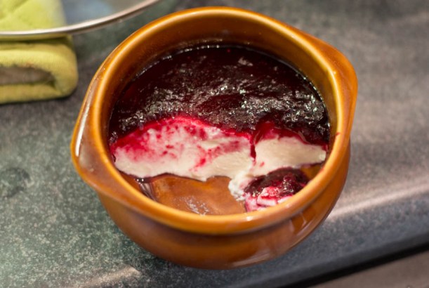 Panna Cotta topped with fresh blueberry jam.
