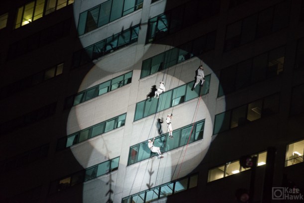 Those are guys in old school uniforms repelling off a building. One might ask, what this has to do with baseball.