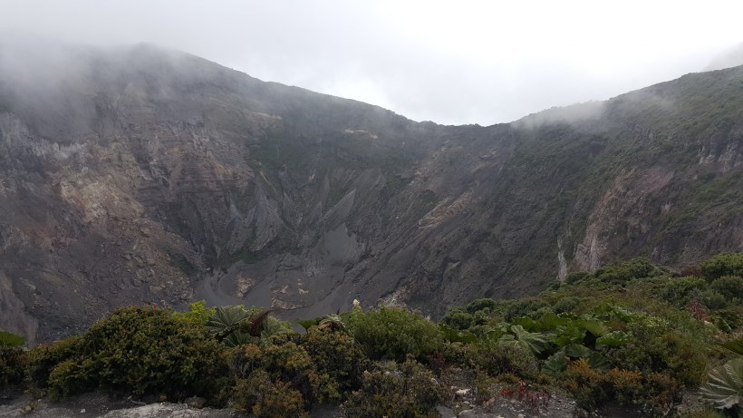 Those are mostly clouds with a little bit of some. If I could have approached that edge, I could have seen a lake below in the center of the crater completely devoid of life. This is the active crater at Irazu.